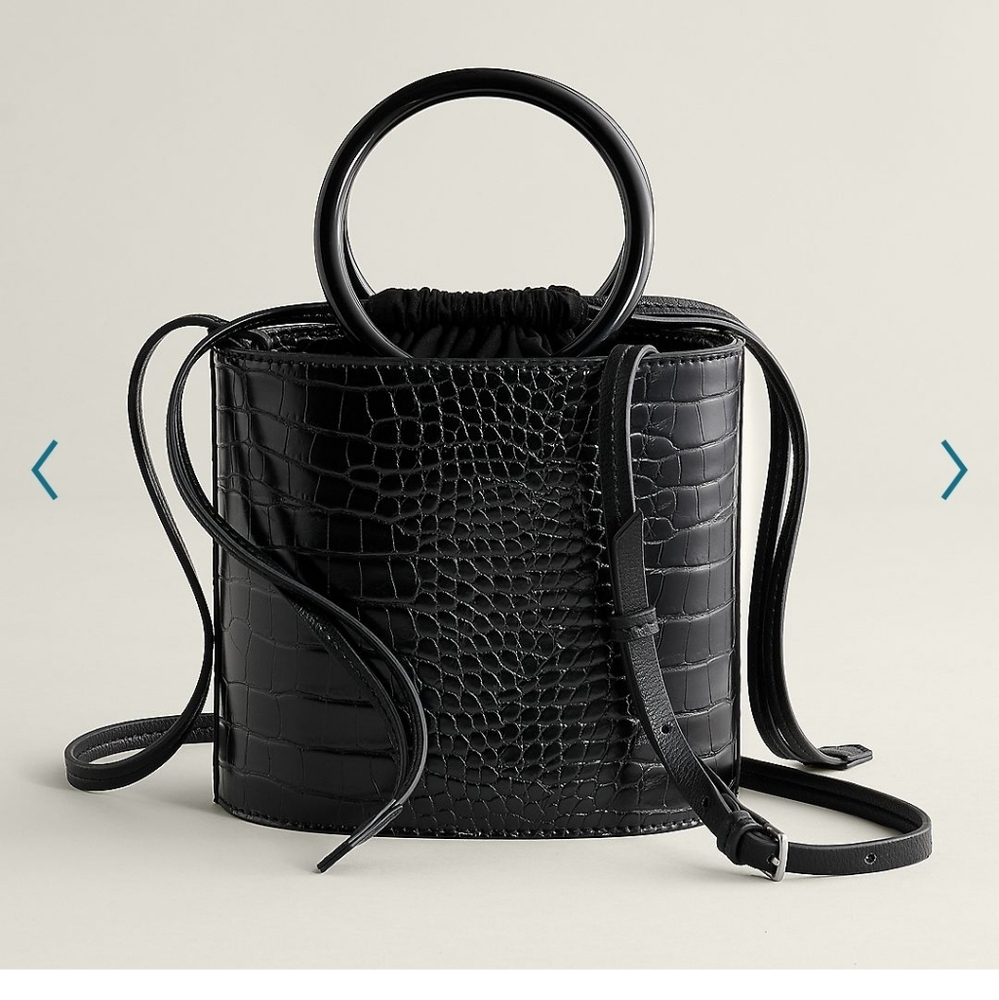 Women purse Elizabeth and James